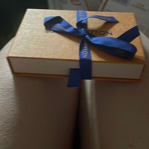 LV. Chain with lock and key in brand new condition.